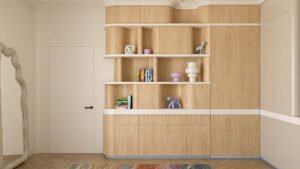 Nowoczesna zabudowa z jasnego drewna z zaokrąglonymi półkami i książkami.